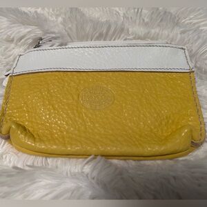 Roots Yellow and White Leather Wristlet